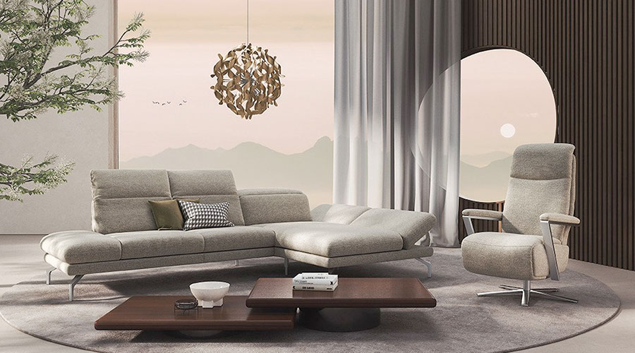 ELENA. Ein Zweisitzer-Sofa mit Longchair rechts, in silbergrauem Flachgewebe und auf satinierten Nickelfüßen verbreitet die angenehme Atmosphäre von dezentem Luxus. Das schlanke reduzierte Sofa korrespondiert in ansprechender Weise mit der Form- und Farbgebung des Drehsessels ENNO.   Gesehen bei  Möbelhaus Wallnöfer in Naturns.   ENNO. Drehsessel mit komfortabler  Polsterung und wohltuenden  Relaxfunktionen, die keine  Wünsche offen lassen.   Gesehen bei  Möbelhaus Wallnöfer  in Naturns. 