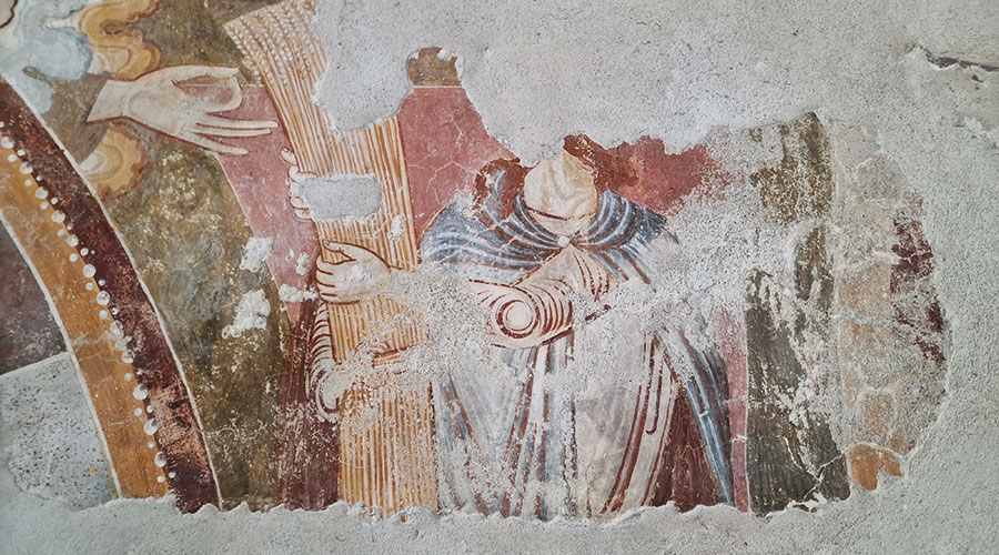 Kain mit der Garbe in der Hand und darüber die fragende Hand (Archiv Heinrich Moriggl)