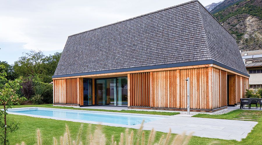 Gartenheim Latsch  von Architekt Alexander Tartarotti Jury-Statement: „Dieses Gebäude sprengt das Konzept des freistehenden Wohnhauses....Vor allem stellt die Wahl des Bautyps mit einem übereinandergesetzten Einfamilienhaus eine Neuinterpretation des Doppelhauses dar.“ Foto: Tim Love Weber Photography